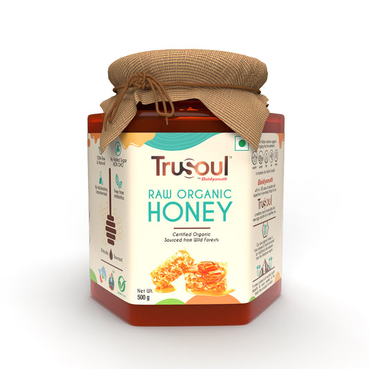 Trusoul Raw Organic Honey 500g jar with cloth lid, certified organic and sourced from wild forests by Baidyanath.